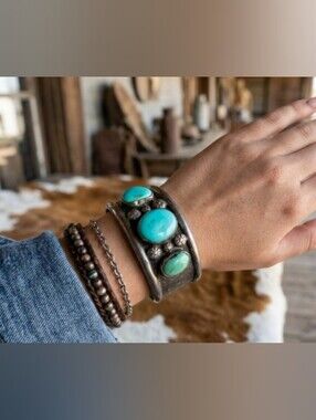 Vintage Sterling Silver Cuff Bracelet features 3 oval Blue Turquoise Stones.
